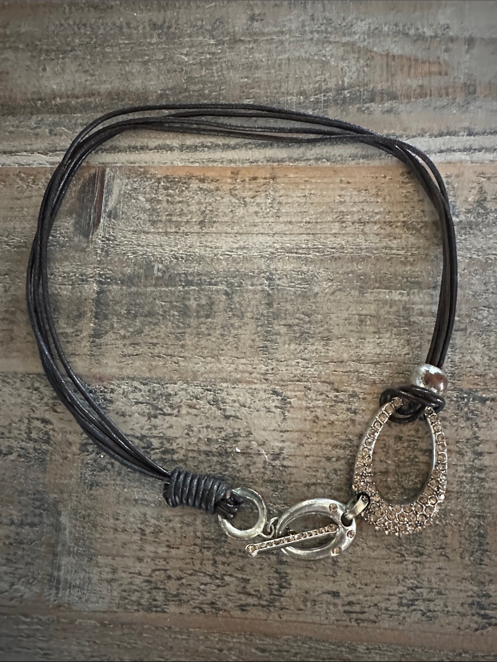 Rhinestone Oval Toggle Cord Necklace in Dark Brown